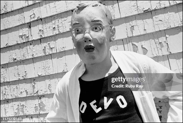 American New Wave musician Mark Mothersbaugh, of the band Devo and in character as Booji Boy, in San Francisco, California, 1977. He wears a Devo...