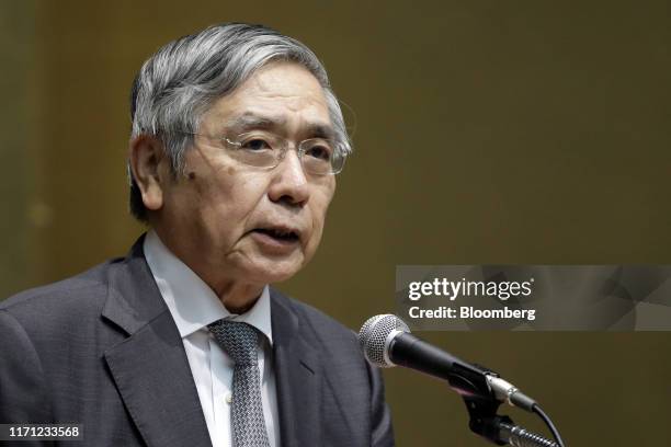 Haruhiko Kuroda, governor of the Bank of Japan , speaks during a Japan Securities Dealers Association event in Tokyo, Japan, on Thursday, Sept. 26,...