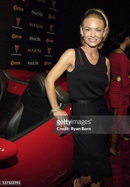 Kelly Carlson with 2006 Pontiac Solstice roadster during 2006 Maxim Hot 100 Party - Red Carpet at Buddha Bar in New York City, New York, United...