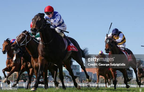 Jockey Jye McNeil riding Super Titus wins Race 4, ZircoDATA Heatherlie Stakes during Melbourne Racing Memsie Stakes Day at Caulfield Racecourse on...
