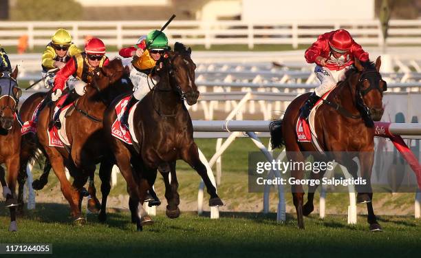 Jockey Damian Lane riding Age of Chivalry to win Race 9, Ladbrokes Odds Boost Handicap during Melbourne Racing Memsie Stakes Day at Caulfield...