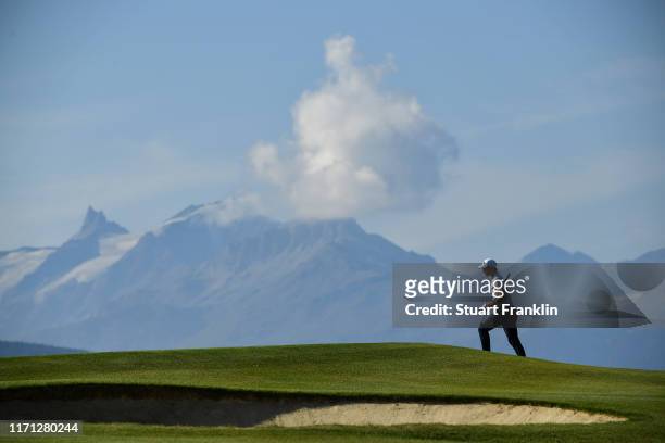 Thomas Detry of Belgium walks on the seventh hole during Day three of the Omega European Masters at Crans Montana Golf Club on August 31, 2019 in...
