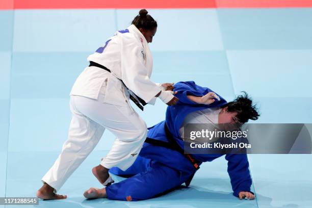 Beatriz Souza of Brazil and Iryna Kindzerska of Azerbaijan compete in the Women's +78kg Repechage on day seven of the World Judo Championships at the...