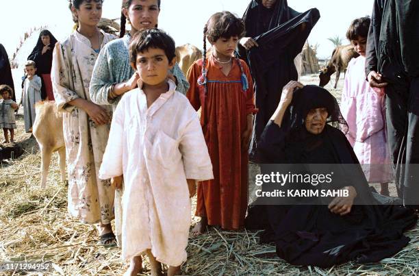 Photo d'illustration représentant une famille chiite irakienne dans la région marécageuse du Sud de l'Irak Al-Ahwar , dont l'histoire remonte à...