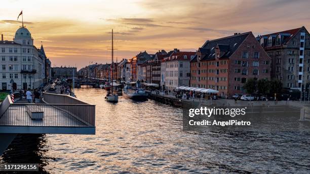 sunset in the nyhavn - copenhagen - copenhague stock pictures, royalty-free photos & images