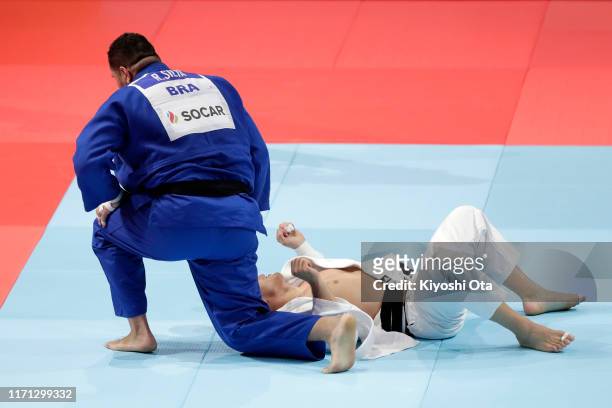 Rafael Silva of Brazil reacts after his victory over Henk Grol of the Netherlands in the Men's +100kg Repechage on day seven of the World Judo...