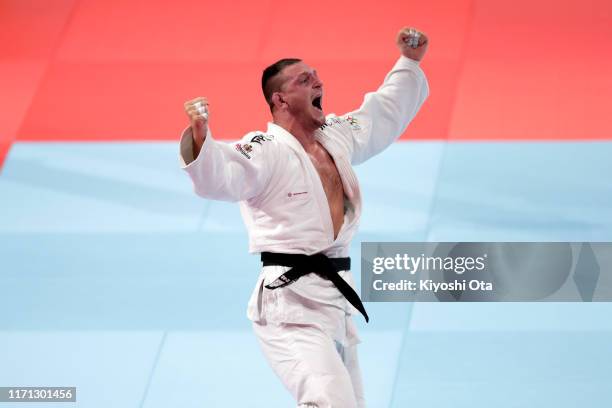 Lukas Krpalek of the Czech Republic celebrates his victory over Kim Minjong of South Korea in the Men's +100kg on day seven of the World Judo...