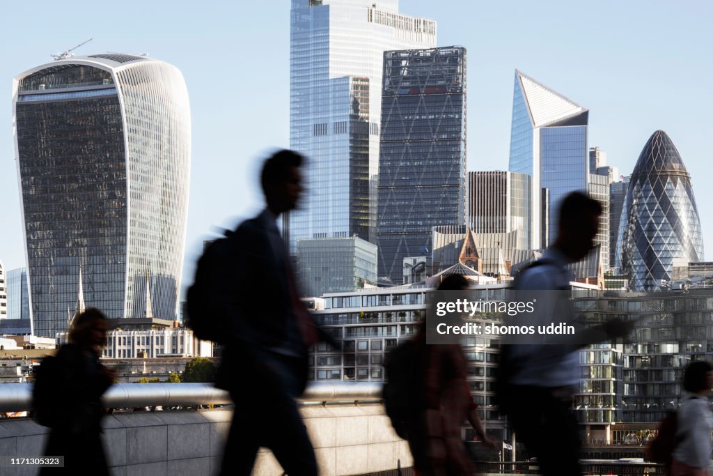 London city workers against high rise office buildings