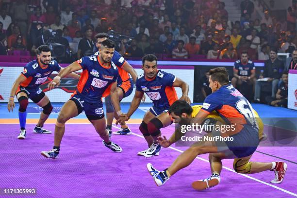 Players of Bengal Warriors and Telgu Titans in action during the Pro Kabaddi League match at SMS Indoor Stadium in Jaipur,Rajasthan, India, Sept 25,...