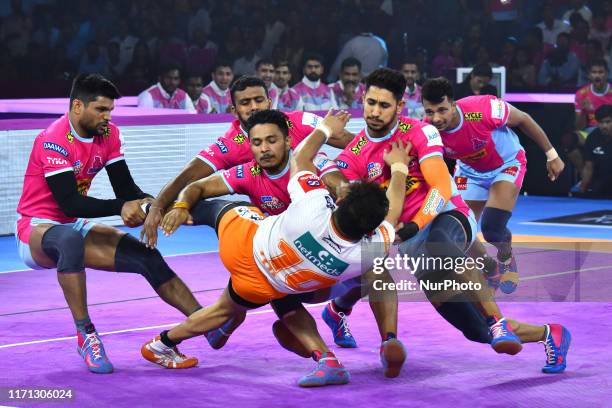 Players of Puneri Paltan and Jaipur Pink Panthers in action during the Pro Kabaddi League match at SMS Indoor Stadium in Jaipur,Rajasthan, India,...