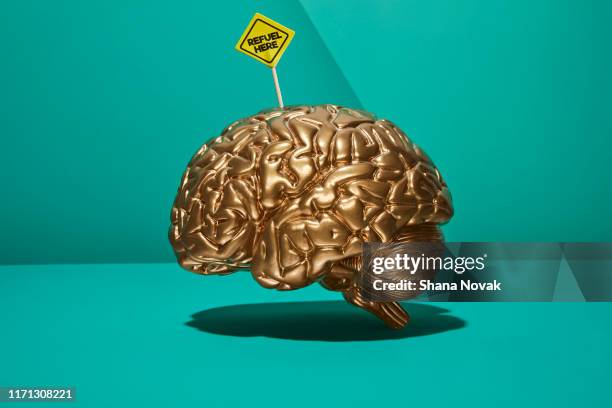 brain with refuel sign - mental illness awareness stock pictures, royalty-free photos & images