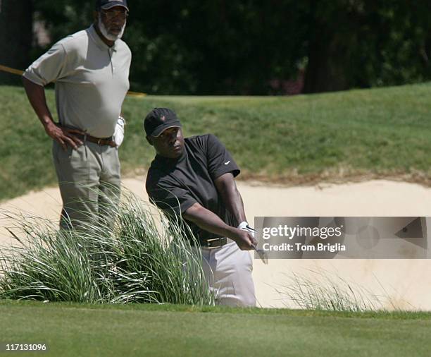 All Pro Running Back two time Super Bowl Champ from the St. Louis Rams Marshall Faulk hits out of a trap at the Ron Jaworski Celebrity Golf Challenge...