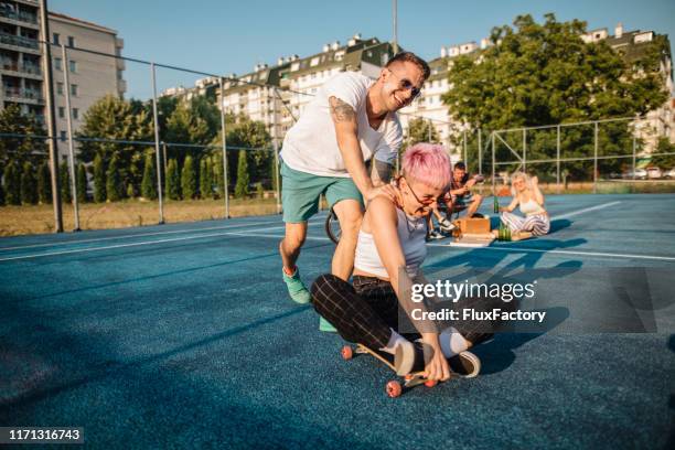 i will always push you forward! - how do i ride my boyfriend stock pictures, royalty-free photos & images