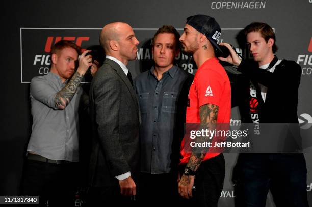 Mark O. Madsen of Denmark and Danilo Belluardo of Italy face off during the UFC Fight Night Ultimate Media Day at the Radisson Blu Scandinavia Hotel...