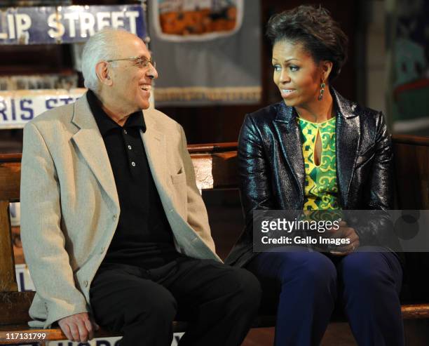 First lady Michelle Obama meets with struggle icon and President of the Robben Island Committee Ahmed Kathrada at the District Six Museum on June 23,...