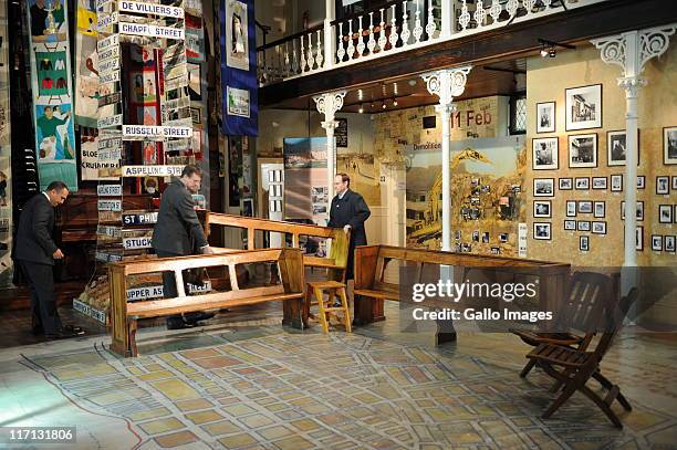 Museum curators prepare for U.S. First lady Michelle Obama's visit to the District Six Museum on June 23, 2011 in Cape Town, South Africa. The First...