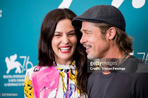 Liv Tyler and Brad Pitt attend "Ad Astra" photocall during the 76th Venice Film Festival at Sala Grande on August 29, 2019 in Venice, Italy.