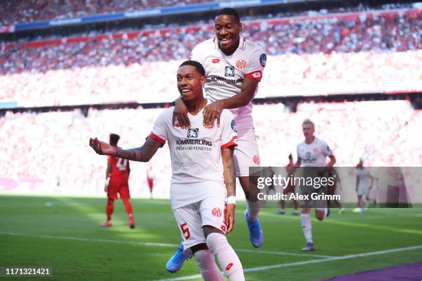 Jean-Paul Boetius of 1. FSV Mainz celebrates after scoring his team's first goal during the Bundesliga match between FC Bayern Muenchen and 1. FSV...