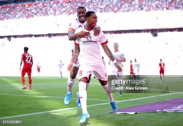 Jean-Paul Boetius of 1. FSV Mainz celebrates after scoring his team's first goal during the Bundesliga match between FC Bayern Muenchen and 1. FSV...