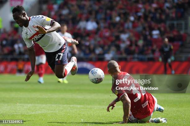 Marc Bola of Middlesbrough is tackled by Pedro Pereira of Bristol City during the Sky Bet Championship match between Bristol City and Middlesbrough...