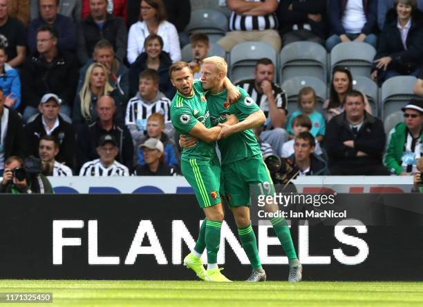 Will Hughes of Watford celebrates after scoring his team's first goal during the Premier League match between Newcastle United and Watford FC at St....