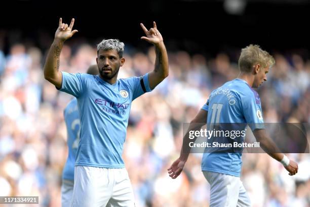 Sergio Aguero of Manchester City celebrates after scoring his team's third goal during the Premier League match between Manchester City and Brighton...
