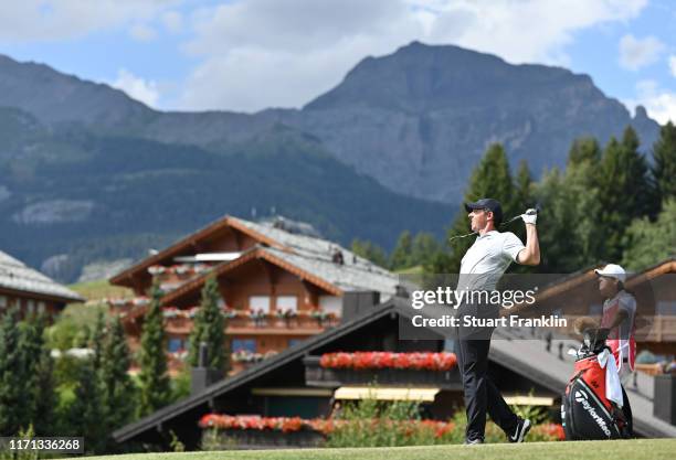 Rory McIlroy of Northern Ireland reacts to a shot on the 14th hole during Day three of the Omega European Masters at Crans Montana Golf Club on...