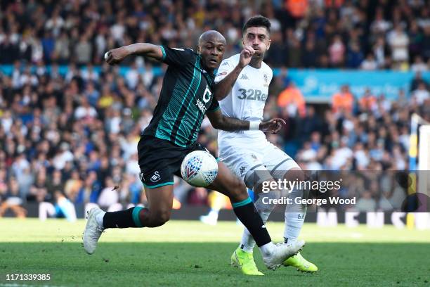 Pablo Hernandez of Leeds United battles for the ball with Andre Ayew of Swansea City during the Sky Bet Championship match between Leeds United and...