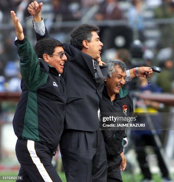 Bolivian coach Carlos Aragones celebrates Bolivia's first goal with his compatriots. Bolivia and Argentina placed each other 25 April 2001 in La Paz...