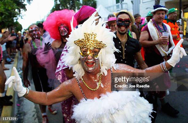 Costumed revelers participate in a Fantasy Fest October 26, 2001 in Key West, FL. The costume and mask event lasts 10 days.