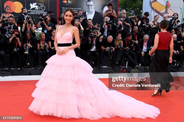 Min Pechaya Wattanamontri walks the red carpet ahead of the "Joker" screening during the 76th Venice Film Festival at Sala Grande on August 31, 2019...