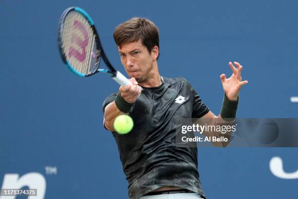 Aljaz Bedene of Slovenia returns a shot during his Men's Singles third round match against Alexander Zverev of Germany on day six of the 2019 US Open...