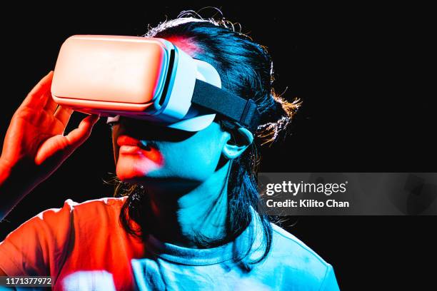 Human Using Virtual Headset Virtual Reality Headset Red Photos and Premium High Res Pictures ...