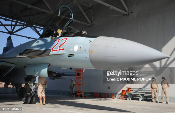 Russian air force Sukhoi Su-35 fighter jet is prepared for take off at the Russian military base of Hmeimim, located south-east of the city of...