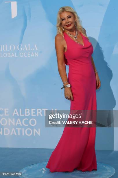 Monika Bacardi poses upon her arrival at the third Monte-Carlo Gala for the Global Ocean in Monaco on September 26, 2019. - Prince Albert II of...