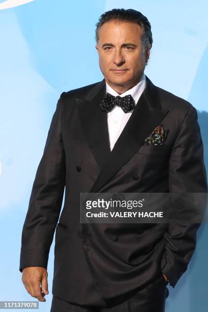 Actor Andy Garcia poses upon arrival at the third Monte-Carlo Gala for the Global Ocean in Monaco on September 26, 2019. - Prince Albert II of Monaco...