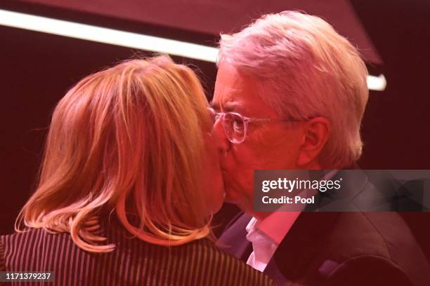 Host Frank Elstner kisses his wife Britta Gessler after receiving the 'Best Newcomer' award during the YouTube Goldene Kamera Digital Awards at...