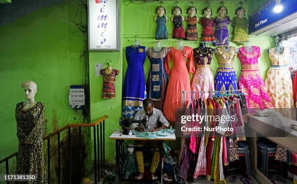 Tailor shop in Kolkata, India, 26 September, 2019. People of Kolkata shops before the big festival, Durga Puja starts. Durga Puja will begin from 04...