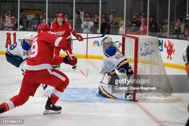 Jordan Binnington of the St. Louis Blues makes first period save on Anthony Mantha of the Detroit Red Wings during a pre-season Kraft Hockeyville...