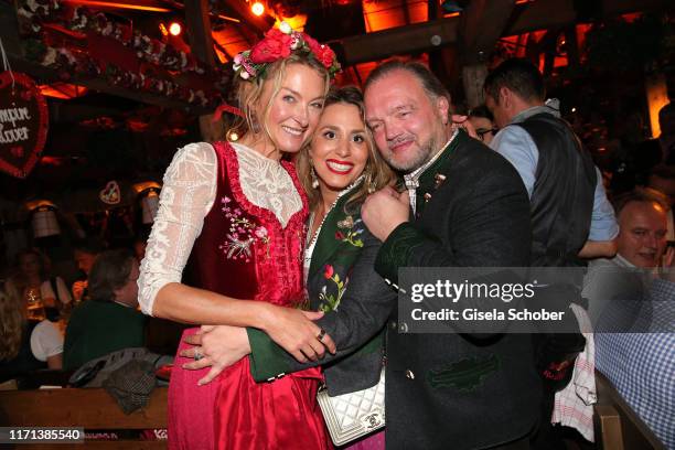 Lilly zu Sayn-Wittgenstein-Berleburg and Fuerst Alexander zu Schaumburg-Lippe and his partner Mahkameh Navabiat during the Oktoberfest 2019 at...