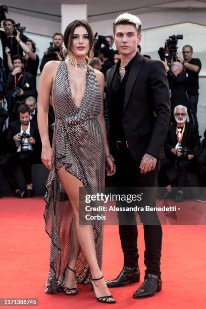 Bella Thorne and Benjamin Mascolo walk the red carpet ahead of the "Joker" screening during the 76th Venice Film Festival at Sala Grande on August...