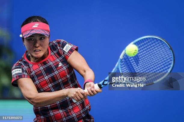 Makoto Ninomiya of Japan in action during the Ladies Doubles semifinal and her partner Zhaoxuan Yang of China against Yingying Duan of China and...