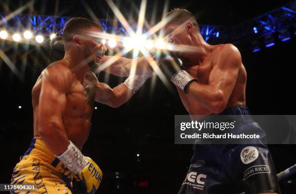 Vasily Lomachenko and Luke Campbell are pictured during the WBA, WBO, WBC Lightweight World Title contest between Vasily Lomachenko and Luke Campbell...