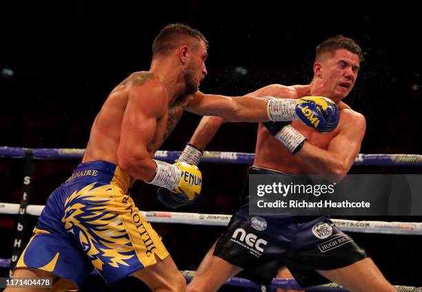 Vasily Lomachenko and Luke Campbell are pictured during the WBA, WBO, WBC Lightweight World Title contest between Vasily Lomachenko and Luke Campbell...