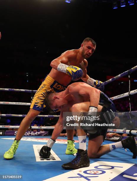 Vasily Lomachenko and Luke Campbell are pictured during the WBA, WBO, WBC Lightweight World Title contest between Vasily Lomachenko and Luke Campbell...