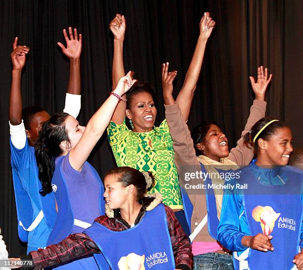 Michelle Obama, first lady of the United States of America celebrates with children at a Youth Soccer Event where she spoke about HIV/AIDS prevention...