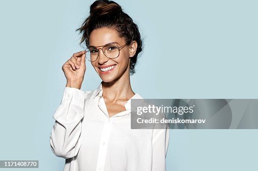 Beautiful young woman wearing glasses Beautiful young woman wearing glasses