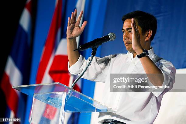 Thai Prime Minister and leader of the Democrat party Abhisit Vejjajiva speaks during a rally held at the site of Red Shirt protesters last year on...