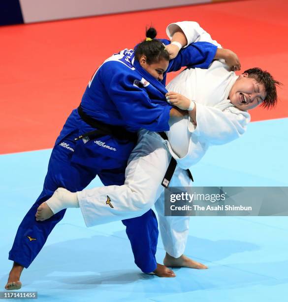 Sara Asahina of Japan and Maria Suelen Altheman of Brazil compete in the Women's +78kg bronze medal bout on day seven of the World Judo Championships...