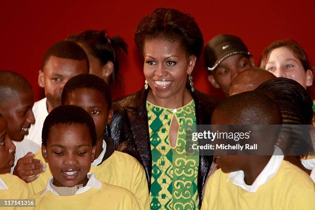 Michelle Obama, first lady of the United States of America poses with children at a Youth Soccer Event where she spoke about HIV/AIDS prevention as...